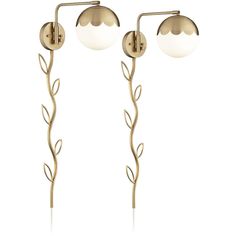 two light fixtures with leaves on them against a white background, one is gold and the other is white