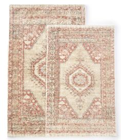 two rugs, one in red and the other in beige with an intricate design