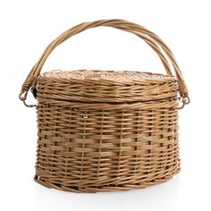 a wicker basket with handle on a white background