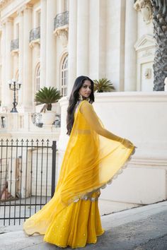 mango yellow georgette lehenga choli Festive Yellow Pre-draped Saree With Mirror Work, Yellow Sharara With Cutdana For Eid, Yellow Pre-draped Saree With Mirror Work For Wedding, Yellow Traditional Wear With Mirror Work, Yellow Sharara For Wedding And Eid, Yellow Anarkali Salwar Kameez With Sheer Dupatta, Yellow Chanderi Saree With Mirror Work, Designer Yellow Saree With Mirror Work, Yellow Mirror Work Traditional Wear For Festive