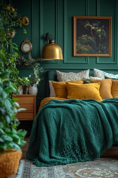 Bedroom design with stylish green and gold throws layered over a bed, offering a pop of color and comfort. Dark Green And Gold Bedroom, Green Gold Bedroom, Gold Accent Furniture