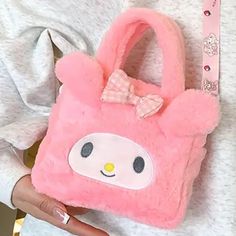 Sanrio My Melody Plush Satchel Bag Purse W/ Strap Pink Fuzzy Hello Kitty Gift Brand New In Original Package No Tags Attached Fuzzy Soft Plush Bag With Strap Great Gift Stocking Stuffer Pink & White My Melody ***Check Out My Other Sarino Items & Save $$ On Shipping When Bundled*** (T2549) Tags Home, Country ,Collectable, Vintage, Figurine ,Office, Boho, Hippie, Stylish, Gift, Fashion, Surfer, Vacation, Beach, Unisex, Vegan, Minimalist, Western, Southwest, Native American, Mid Century, Retro, Chic My Melody Plush, Melody Plush, Sanrio My Melody, My Melody, Satchel Bag, Purse Bag, Crossbody Purse, Hello Kitty, Satchel