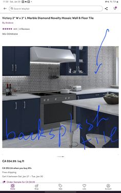 an image of a kitchen with blue and white cabinets