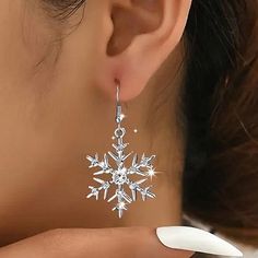 Snowflake Dangle Earrings are a winter wonder! Their titanium steel fishhook design, CZ center accent, and sparkling CZ accents throughout make these 1.18 x 1.79 inches with an approximate 2" drop snowflake earrings a must-have! Winter Formal Accessories, Snowflake Clip On Earrings, Sparkling Silver Christmas Jewelry, Sparkling White Gold Crystal Earrings For Gift, Sparkling Dangle Crystal Earrings Gift, Gift Sparkling Dangle Crystal Earrings, Elegant Snowflake Earrings For Winter, Cubic Zirconia Snowflake Earrings For Gift, Winter Party Dangle Jewelry