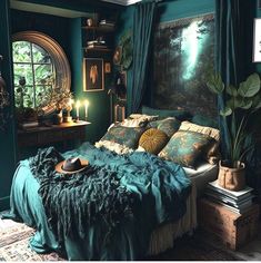 a bed with green sheets and pillows in a room next to a painting on the wall