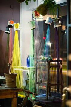 there are many colorful objects on display in the window