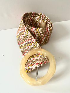 Nice raffia belt in various colors for women. They are elastic so there are no problems with size. They are ideal for summer dresses. beautiful multicolored woven raffia belt, the buckle is a circle of carved wood. It measures 5 cm wide and 105 long, it is elastic so it can be stretched to double its size. Beige Woven Belt For Vacation, Chic Woven Belt For Beach, Chic Woven Belts For Beach, Chic Woven Belts For The Beach, Chic Brown Belt For The Beach, Chic Brown Belt For Beach, Adjustable Woven Belt For Summer, Multicolor Fabric Belt For Summer, Chic Beige Belts For Beach