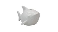 a white ceramic fish figurine on a white background