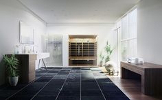 a bathroom with tiled floors and large windows