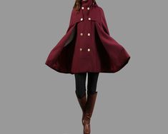 * A cool and long wool cape coat with hood, very elegant. * With double row gold color buttons and two pockets, fully lined. * If you want black or silver buttons, please let us know, thanks. * Stand up collar, more warmer. * Material: out shell - 50% wool, 50% polyester; lining - 100% polyester * Care: dry cleanable * Shop sizing chart FYI ( made according to US sizing. actual body figures, not laying flat clothes measurements) Size XS (US 2, UK 6, German 32, French 34, ) Bust: fits bust around Traditional Brown Winter Cape, Medieval Winter Cape Outerwear, Red One Size Cape Poncho, High Neck Coat, Multicolor Long-sleeved Winter Cape, Red One-size Poncho Cape, Wool Cloak, Mantel Cape, Cloak Coat