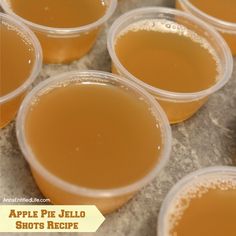 several cups filled with apple pie jello shots