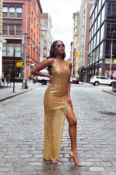 Be the queen of the night in our LOUISA Gold. This beautiful beaded dress with a square neckline and thigh-high split will turn heads. The beaded gold fabric is exclusively designed and will figure hug your body. This is a beautiful dress for the season ahead. Made from our exclusive gold beaded embellished fabric.

#GoldDress #MaxiDress #SequinDress Hug You