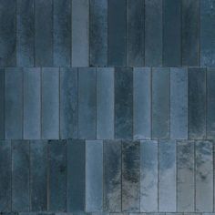 an image of a blue tile wall that looks like it is made out of bricks