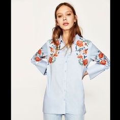 Zara Blue Embroidered Shirt New With Tag Size Medium Color Blue Shoulder 16 Inch Bust 19.5 Inch Length 26-33 Inch Approx Size Measurements Are Approximate Blue Embroidered Collared Blouse, Blue Button-up Tops With Floral Embroidery, Embroidered Collared Blue Tops, Blue Floral Embroidered Button-up Top, Casual Blue Embroidered Shirt, Zara Light Blue Long Sleeve Shirt, Blue Floral Embroidery Blouse For Work, Blue Floral Embroidered Button-up Blouse, Blue Embroidered Button-up Blouse