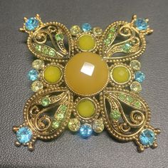 Beautiful Gold Filled Brooch/Pendant. Size Is 2”*2”. Heavy. Looks Gorgeous And Bright. Excellent Condition Multicolor Round Brooch Jewelry, Yellow Gold Pendant Brooches As Gift, Green Round Brooch For Gift, Green Round Brooches For Gift, Gold Brooch With Large Pendant As Gift, Elegant Multi-stone Brooches For Gifts, Gold Gemstone Round Brooch, Blue Gemstone Brooch For Gift, Gold Gemstone Round Brooches