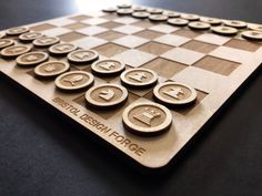 a wooden chess board with buttons on it