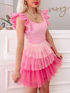 The Shades of Sassy Skirt from Sassy Shortcake is an ombre, tiered, pink tulle, ruffle, skirt. She features an elastic waistband. Lined. Fits true to size, model wearing a size small. Tulle Ruffle Skirt, Sassy Shortcake, Ombre Pink, Tiered Ruffle Skirt, Pink Tulle, Pink Ombre, Ruffle Skirt, Shades, Models