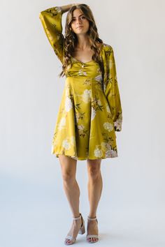 Get ready to shine in our Quintero Flared Satin Dress. This golden yellow dress will make heads turn with its stunning color and flared design. Perfect for any occasion, it's sure to make you stand out and feel confident. Details self: 100% polyester lining: 100% rayon Fabric Care Guide Here Sizing & Fit Measurements are approximate and taken while laying flat across the front. Not doubled. small: bust = 15.5"; length = 28" medium: bust = 16.25"; length = 28.25" large: bust = 17"; length =28.5 " Flared Satin Dress, Golden Yellow Dress, Ruffled Denim Jacket, Piper And Scoot, Puff Sleeve Sweater, Striped Sweater Dress, Striped Knit Dress, Rayon Fabric, Satin Dress