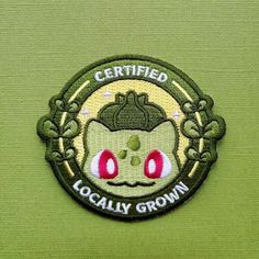 a patch with the words certified locally grown on it