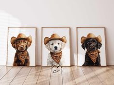 three dogs wearing cowboy hats and bandanas on their heads are hanging in front of a white wall