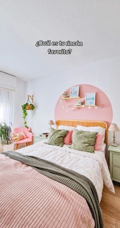 a bedroom with pink and green accents, white walls and wood flooring is pictured in this image