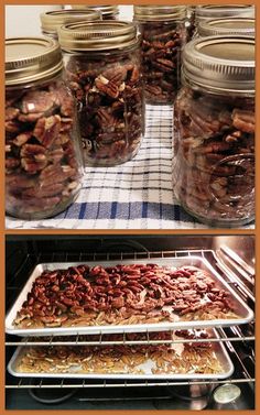 there are many jars filled with nuts on top of a table and in the oven