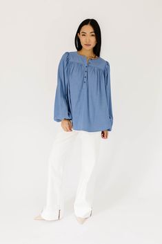 this retro-inspired long sleeve top will take you from summer picnics to fall photoshoots with ease. made with a dark wash denim-esque material, this elevated top features long balloon sleeves + a flowy silhouette. dress it up with trousers + heels, or down with white jeans + sandals. medium wash // high neckline, buttons, balloon sleeves, elastic cuffs paired with our camelot wide leg denim model is 5'8" + wearing a small measurements are approximate + taken while laying flat small : bust 42” l Jeans Sandals, Jean Sandals, Summer Picnics, Silhouette Dress, Long Balloons, Summer Picnic, Dark Wash Denim, Wide Leg Denim, Balloon Sleeves