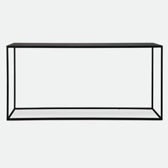 a black table with a glass shelf on the top and bottom, in front of a white background