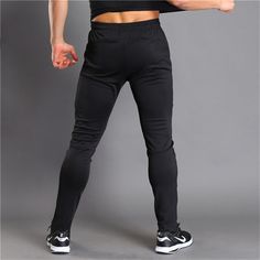 Material: Polyester • Length: Full Length • Style: Sweatpants, Flat, Casual, Gyms Casual • Decoration: Fake Zippers • Type: Full Length, Elastic Waist, Mid, Broadcloth, Regular • Waist Size(In Inches): 2.3-2.9 Slim Fit Black Pants With Pockets, Black Stretch Sportswear Bottoms, Tight Black Pants With Pockets, Black Fitted Pants With Pockets, Black Tight Bottoms With Elastic Waistband, Training Bottoms With Elastic Waistband, High Stretch Black Training Pants, Training Pants With Elastic Waistband, Stretch Black Training Pants