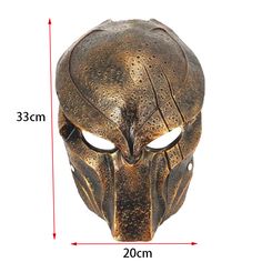 an image of a mask that is made out of bronze colored metal and has the measurements for