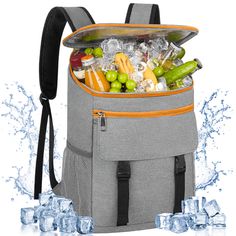 the cooler bag is filled with drinks and ices