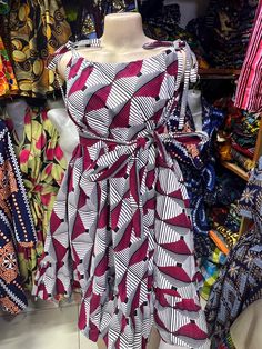 This African dress is made of African fabric known as Kitenge or Kente. Its a free size meant to fit all. Sizes can however be personalized. Size ; Free zize Bulk orders available Thank you for shoppibg with us! African Dress Short, Dress Kitenge, Free Size Dress, Kitenge Dress, Kitenge, African Fabric, Dress Short, African Dress, Dress Clothes For Women