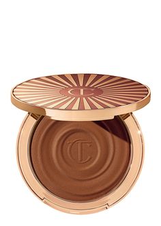 Long Description#Product Details#Introducing Charlotte Tilbury’s Beautiful Skin Sun-Kissed Glow Bronzer for a beautiful healthy beachy bronzed glow from head to toe. This is Charlotte’s bronzing formula that gives everyone everywhere an easy summer bronze glow every day. It’s not a powder it’s not a gel – it’s an easy-to-use dream-like cream bronzer that infuses summer into the skin. Charlotte has studied the beautifying effects of sun on the skin – where the sun naturally hits and how it gives a kiss of colour to leave a ‘just back from the beach glow’.  Working with world-leading laboratories and her skincare scientists Charlotte has created a dream-like cream texture that melts into the skin for a confidence-boosting bronze up – it’s like a second-skin glow. It blurs hydrates and gives Charlotte Tilbury Beautiful Skin, Beach Glow, Cream Bronzer, Makeup Secret, Summer Shades, Skin Foundation, Pat Mcgrath, Summer Glow, Skin Benefits