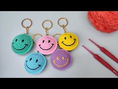 crochet smiley face keychains with needles and yarn