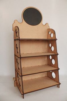 a wooden shelf with three shelves and a mirror on top