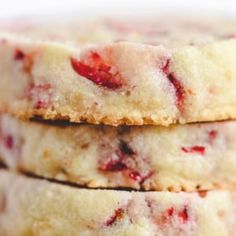 three pieces of strawberry shortbread stacked on top of each other