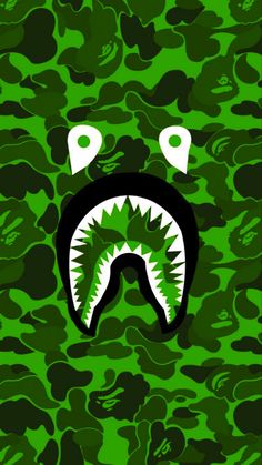 a green camo background with a shark's mouth