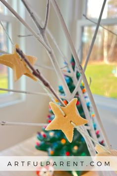 a christmas tree decorated with star shaped cookies