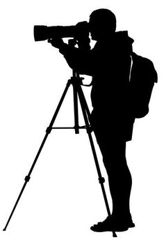 a man standing in front of a tripod with a camera on it's shoulder