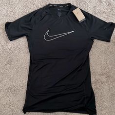 Nike Dri-Fit Training Shirt (Mens) Brand New. Never Worn. Black. Tight Fit. Move To Zero Sustainable Material. Nike Fitted Sports Shirt, Nike Fitted Shirt For Sports, Fitted Nike Sports Shirt, Fitted Nike Shirt For Sports, Nike Fitted Short Sleeve Top, Nike Fitted Graphic Print Top, Nike Fitted Top With Graphic Print, Nike Fitted Casual Shirt, Fitted Nike Top With Graphic Print