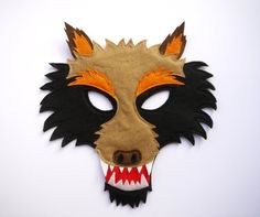 a mask with an animal's mouth and teeth painted on the front, made to look like a wolf