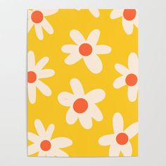 a yellow and white flowered paper with red centers