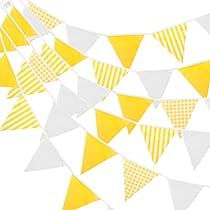 yellow and white bunting flags hanging from the ceiling