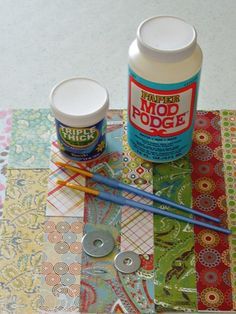 some crafting supplies sitting on top of a table