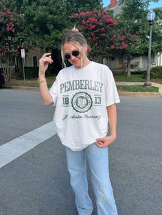 Pemberley Varsity Shirt Pride and Prejudice Shirt Jane Austen Gifts Born to Read Most Ardently Barely Tolerable Mr Darcy Elizabeth Bennet DESIGN Hand printed using DTG (Direct To Garment) method with certified, water-based pigment inks (Innobella Textile Inks) - high durability and washability as the ink has scored 4.0 or higher on the AATCC wash test. The inks are Okeo-Tex, Eco-Pass certified, and CPSIA-compliant.  Ribbed knit collar without seem, making it highly elastic so it retains its shape even after washing Knit in one piece using tubular knit, reducing fabric waste - please note that white ink is not naturally opaque, and when placed on the dark-colored garment it gives a softer feel and vintage appearance MATERIAL 100% Cotton Made from specially spun fibers for a solid and smooth Bachelorette Logo, Personalized Bachelorette, Camp Shirts, Club Logo, Monster Mash, Freddy Krueger, Retro Halloween, Social Club, Lake Michigan