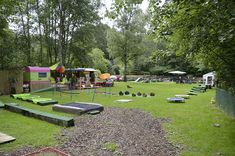 an outdoor play area with lots of toys