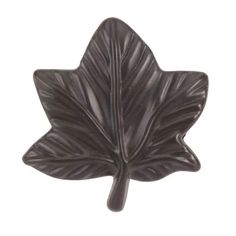 a black leaf shaped object on a white background