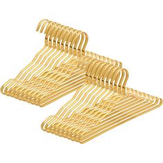 two pairs of gold tone metal hair clips with wavy lines on each side and one pair in the middle