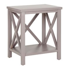 a gray end table with an x design on the top and one shelf below it