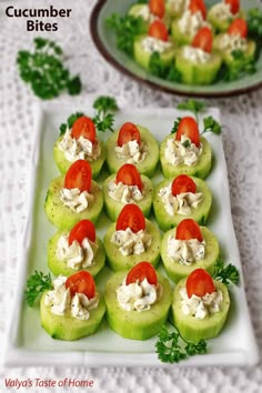 cucumber bites with tomatoes and cream cheese on them are ready to be eaten